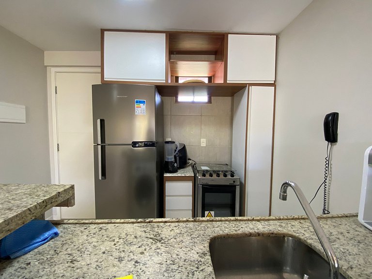 Apartamento incrível em Resort e pé na areia