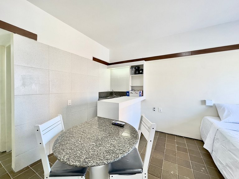Apartamento compacto com vista mar