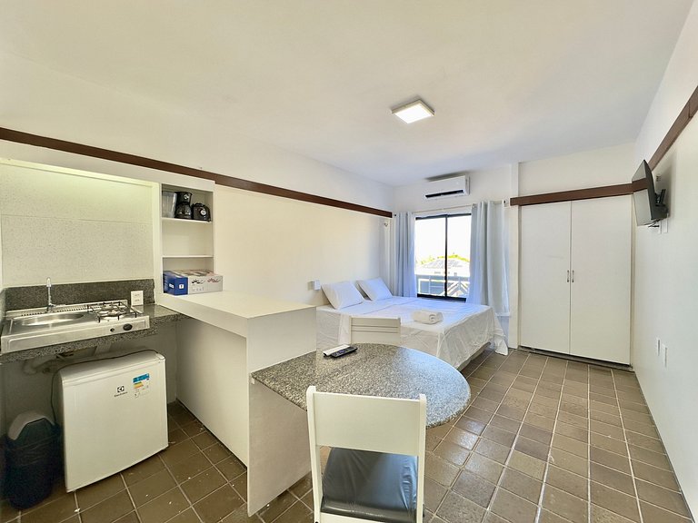 Apartamento compacto com vista mar
