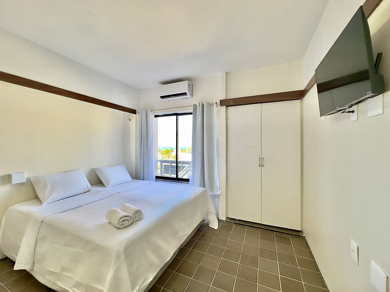 Apartamento compacto com vista mar