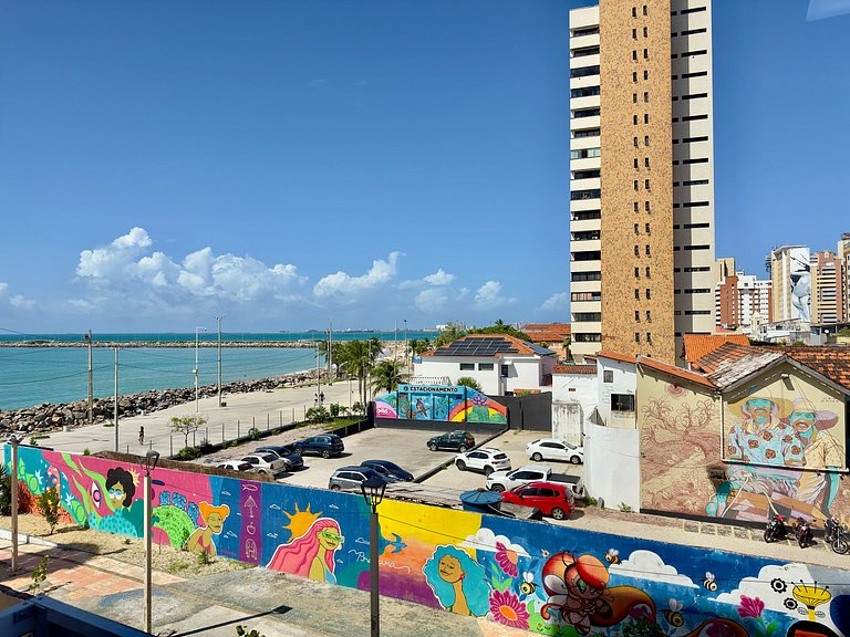 Apartamento compacto com vista mar