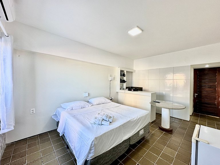 Apartamento compacto com vista mar