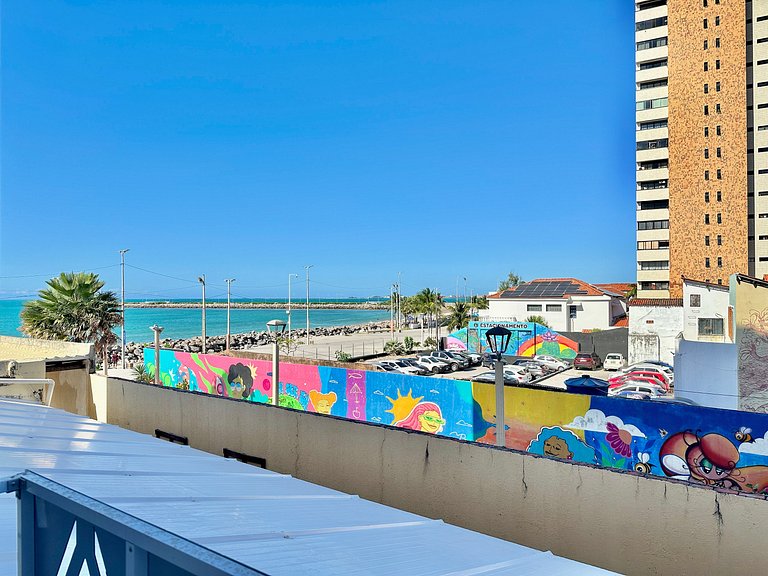 Apartamento compacto com vista mar