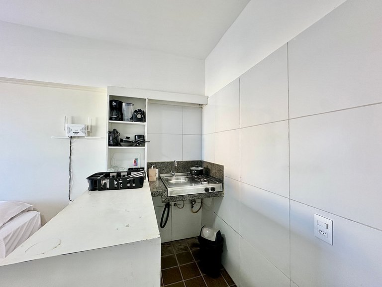 Apartamento compacto com vista mar