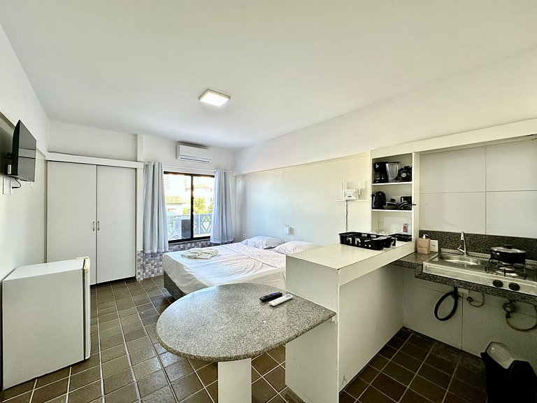 Apartamento compacto com vista mar